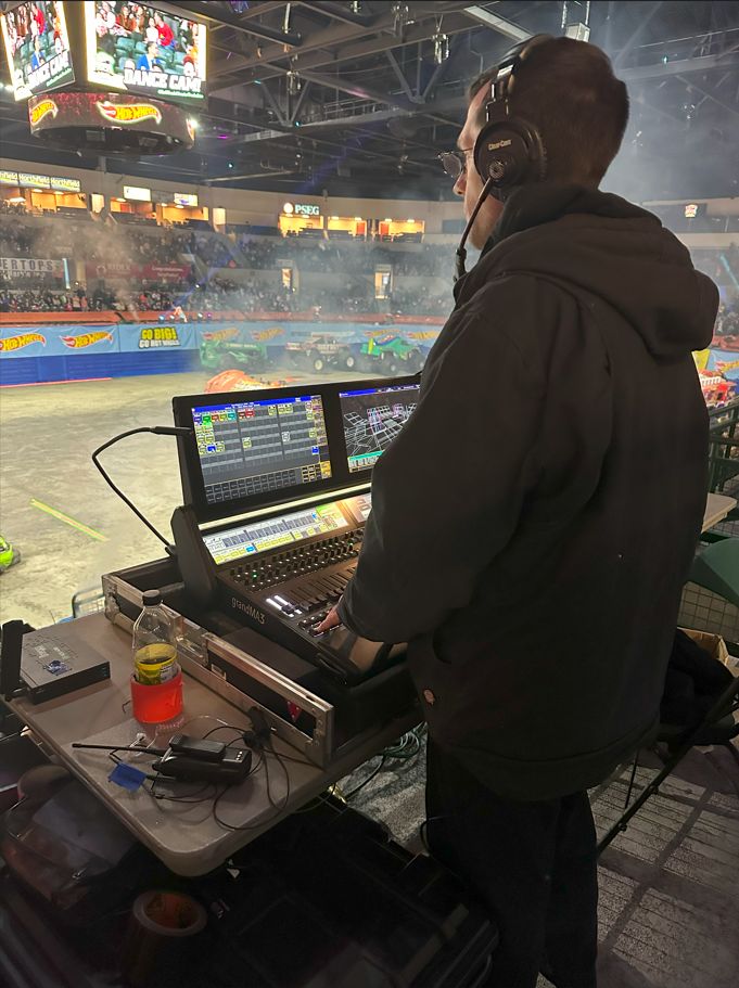 Logan as lighting director on the Hot Wheels Monster Trucks Live tour