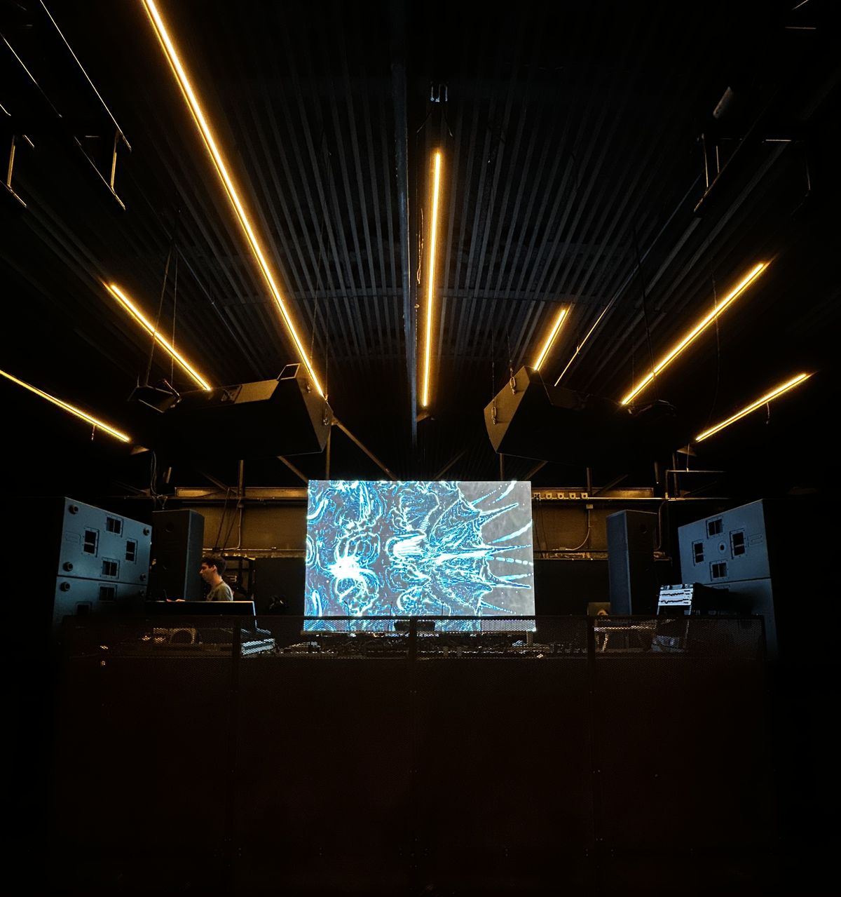 Club visuals and projection at a DJ booth